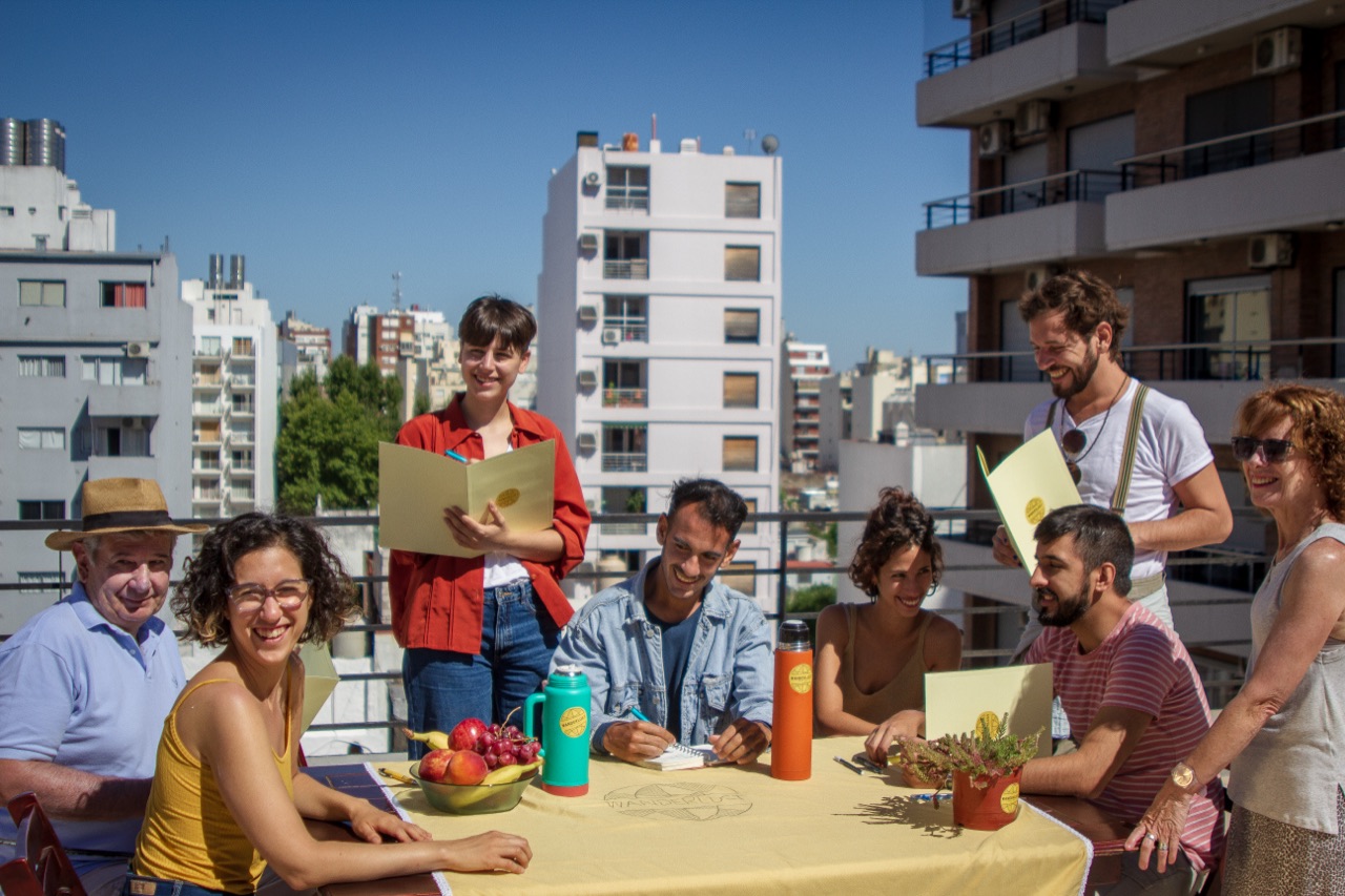 Wanderlust Spanish students studying together on a rooftop terrace overlooking Buenos Aires